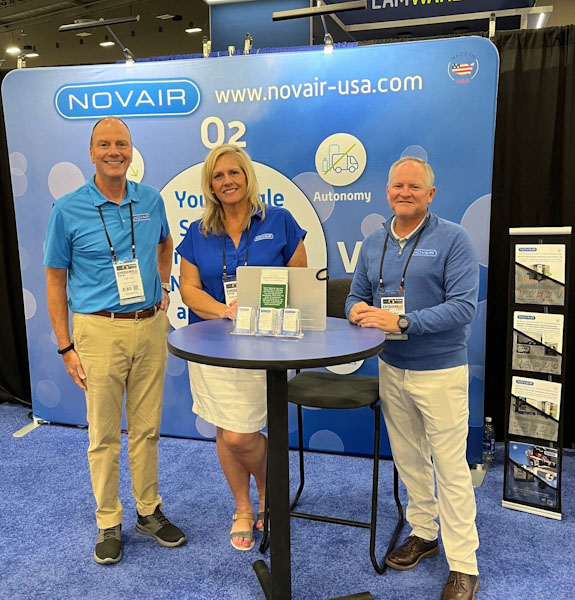 Don Laux, Barbara Wiegand, and Brian Jarvis from the NOVAIR Sales Team at a Trade Show.